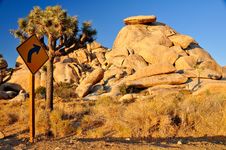 Road Arrow Sign Pointing To Rock Royalty Free Stock Photo Road Arrow Sign Pointing To Rock Royalty Free Stock Photo
