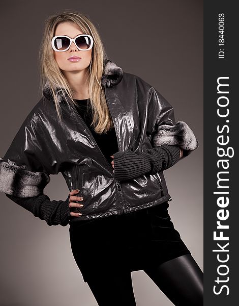 Woman With Sunglasses And Leather Jacket