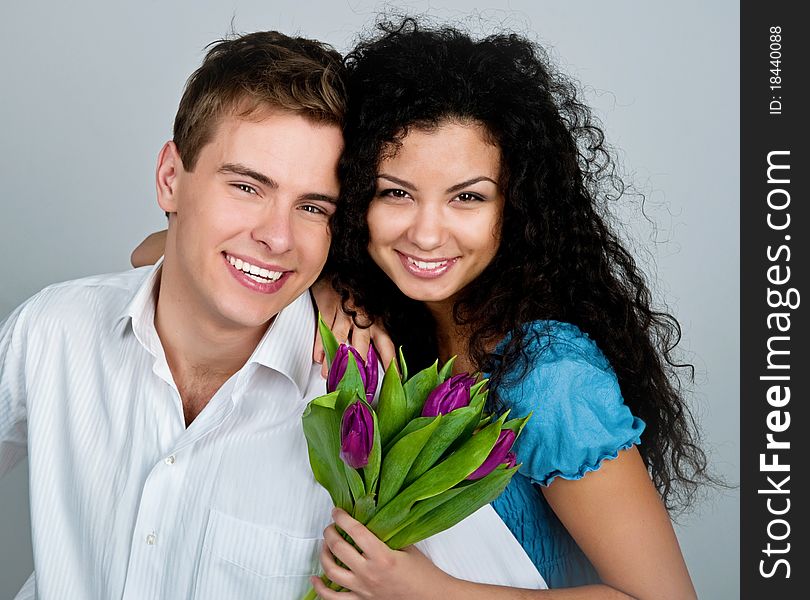 Young couple  over blue background