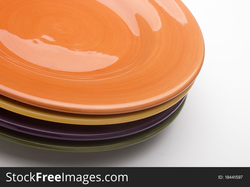 Colorful ceramic plates for the main dishes.