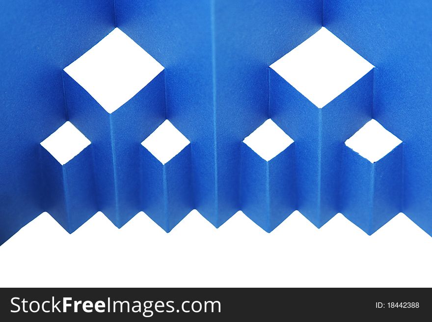 Abstract blue paper composition with cutout rhombus and zigzag