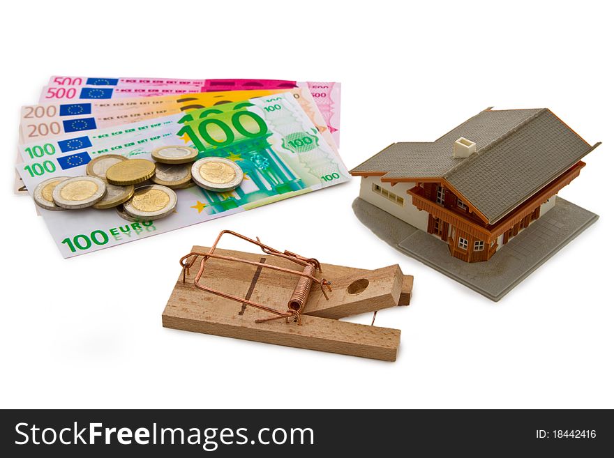 Modell house with euro banknotes and trap on bright background. Modell house with euro banknotes and trap on bright background