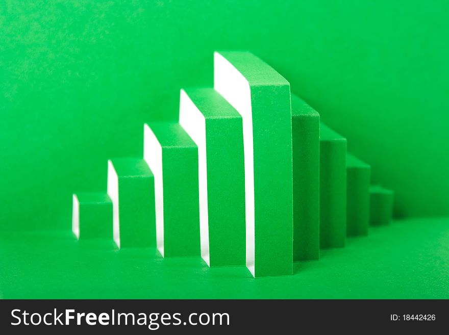 Abstract green paper composition cutout stripes and folds, rhombus shape