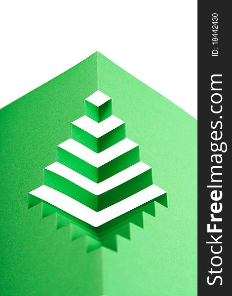 Abstract green paper composition with cutout stripes and folds, rhombus shape