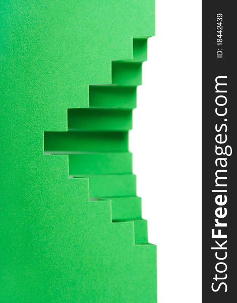 Abstract green paper composition with cutout stripes and folds, rhombus shape. Abstract green paper composition with cutout stripes and folds, rhombus shape