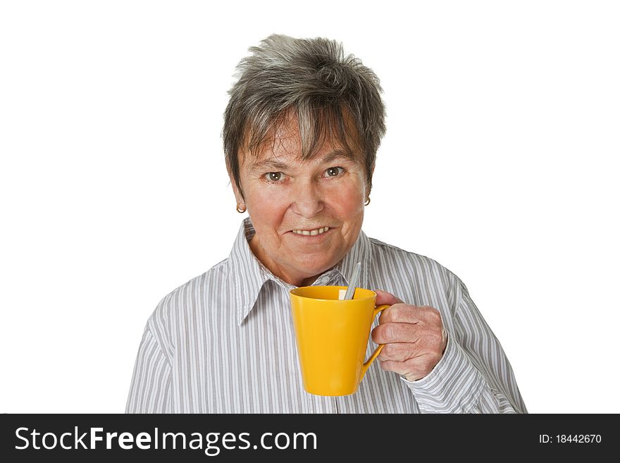 Female senior with cup of coffee isolated on white background. Female senior with cup of coffee isolated on white background