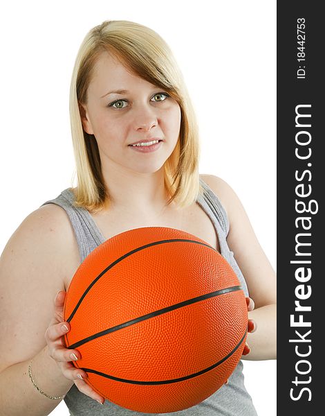 Fitness girl with basketball on a white background. Fitness girl with basketball on a white background