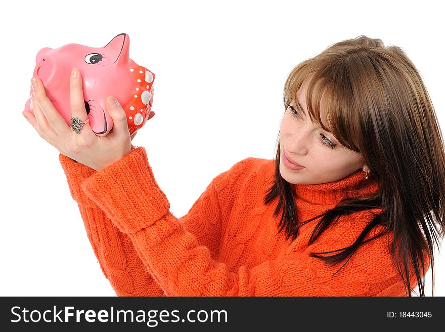 Young beautiful woman standing with piggy bank (money box), isolated on white background. Young beautiful woman standing with piggy bank (money box), isolated on white background