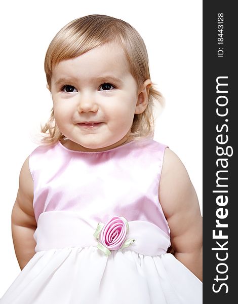 Smiling little girl in beautiful dress