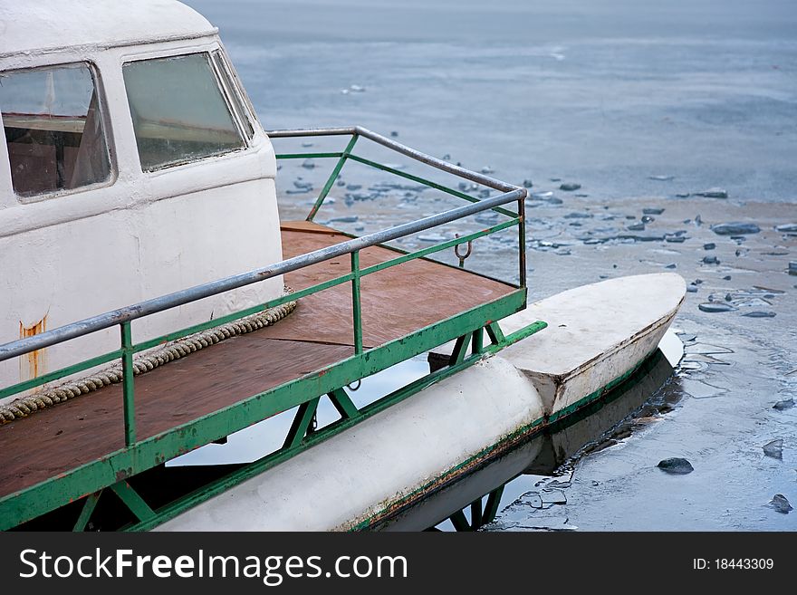 Boat In An Icy Lake