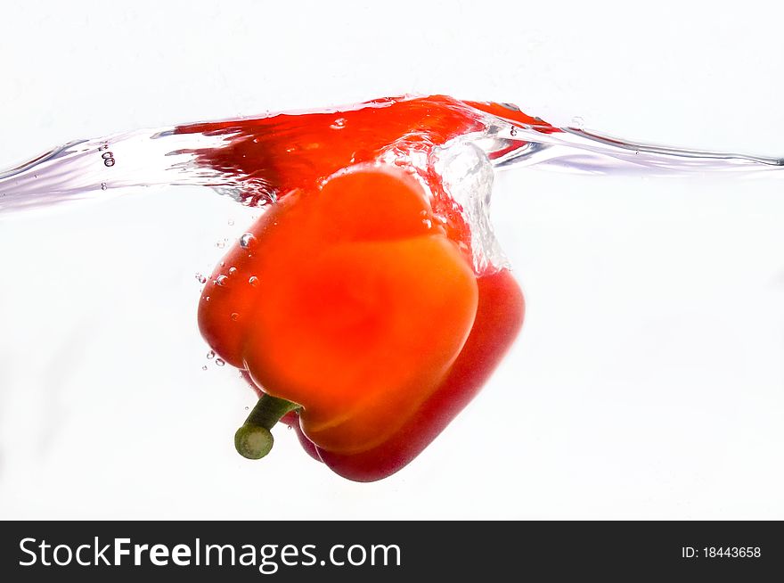 Sweet pepper Splash with isolated white background