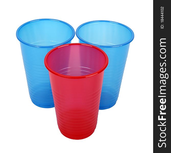 Three plastic glasses separately on a white background