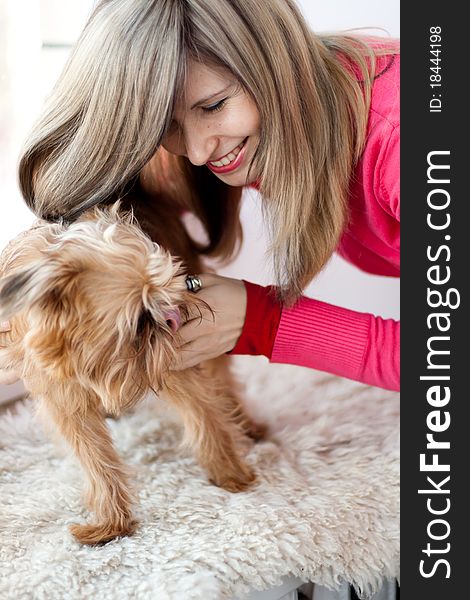 Beautiful girl and smooth haired Brussels Griffon puppy. Beautiful girl and smooth haired Brussels Griffon puppy