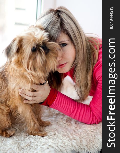 Beautiful girl and smooth haired Brussels Griffon puppy. Beautiful girl and smooth haired Brussels Griffon puppy