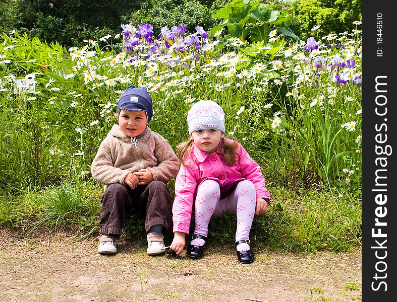 Little boy and girl in park