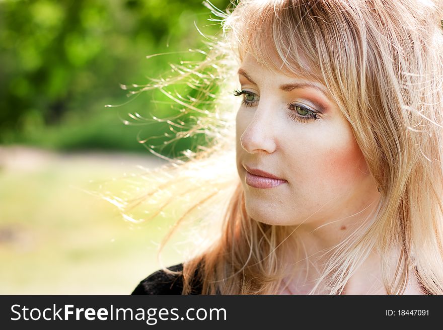 Beautiful blond girl's face closeup. Beautiful blond girl's face closeup