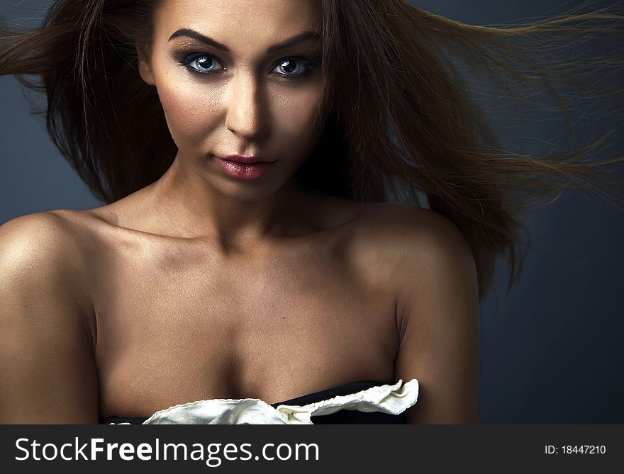 Attractive young woman with red hair. Photo.