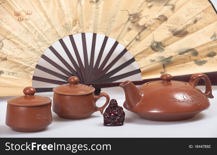 Chinese teapot set, Buddha and fan
