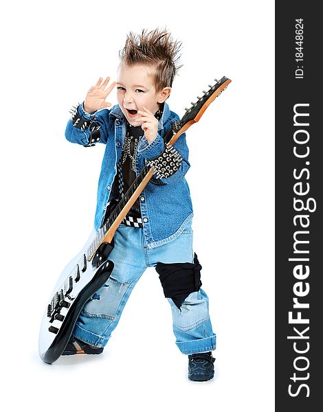 Shot of a little boy playing rock music with electric guitar. Isolated over white background. Shot of a little boy playing rock music with electric guitar. Isolated over white background.