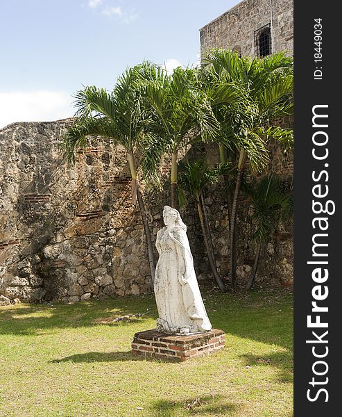 The Old Statue In Front Of Alcazar De Colon