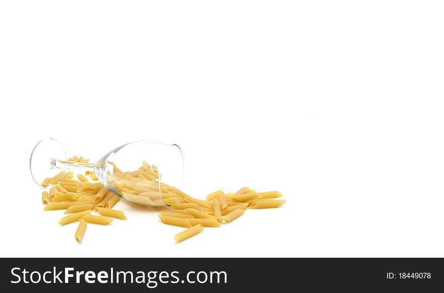A glass of wine with pastas on a whithe background. A glass of wine with pastas on a whithe background