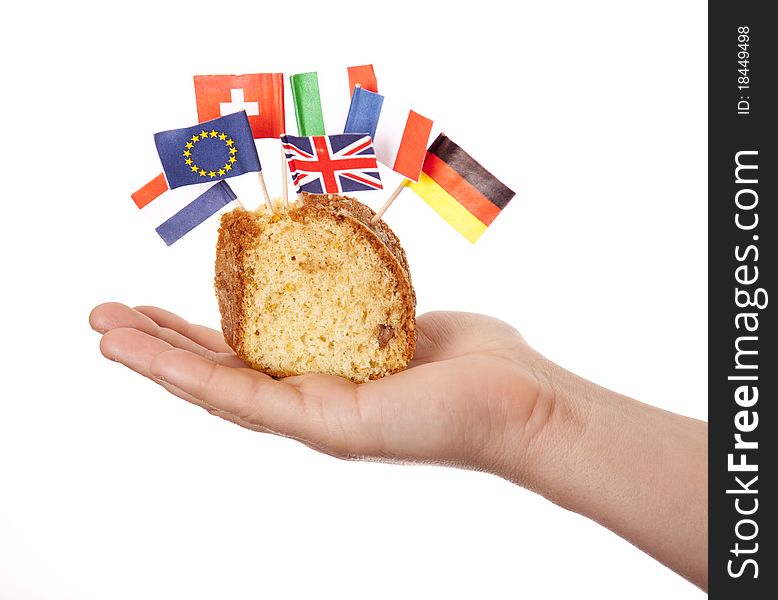 Hand Keep Cake With Some European Flags.