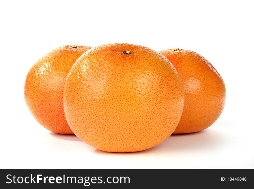 Large grapefruits closeup, on white background