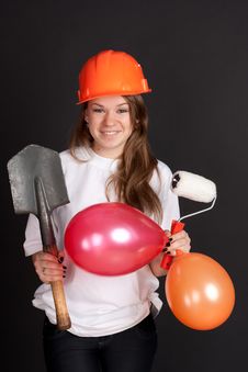 The Girl In The Helmet With Balls And A Shovel Royalty Free Stock Image The Girl In The Helmet With Balls And A Shovel Royalty Free Stock Image