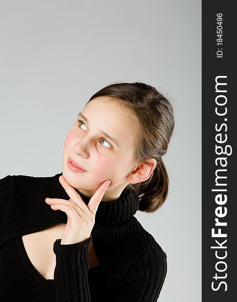 Young cute Teen, on gray background