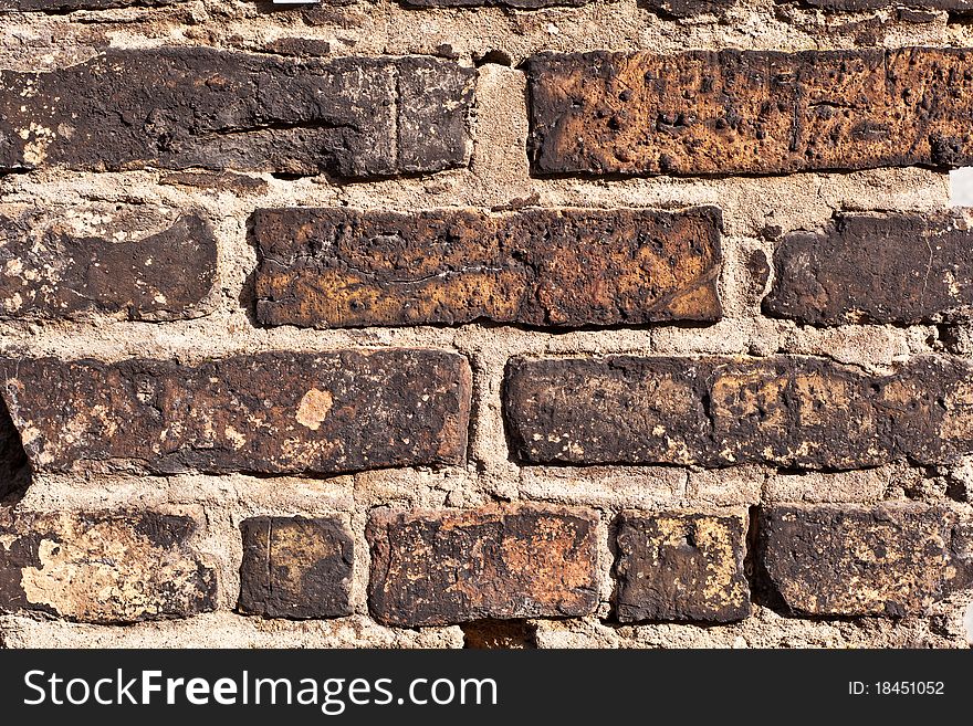 Old brick wall of ahistoric house. Old brick wall of ahistoric house