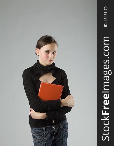 Young cute Teen, on gray background