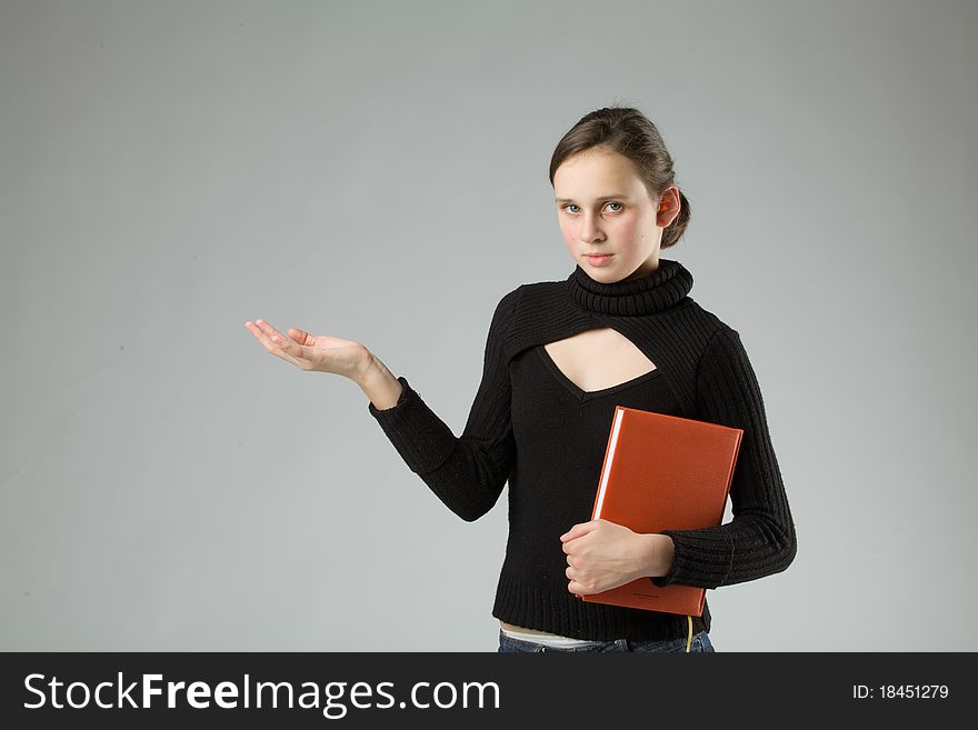 Young cute Teen, on gray background