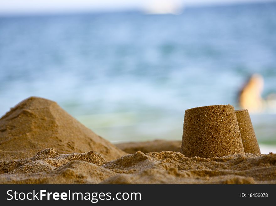 Sand castles on the beach in summer time