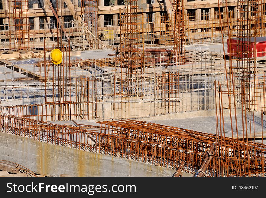 Detail of construction site on sunset warm light. Building from foundation