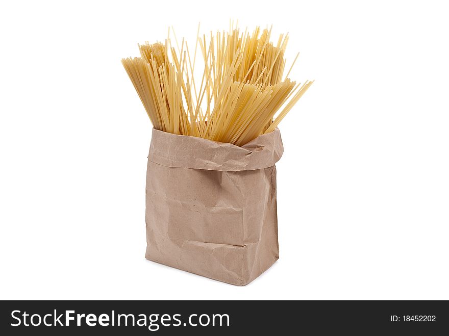 Spaghetti in bag on white