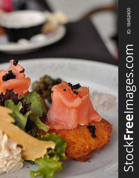 Smoked Salmon with Caviar served on a Potato Pancake