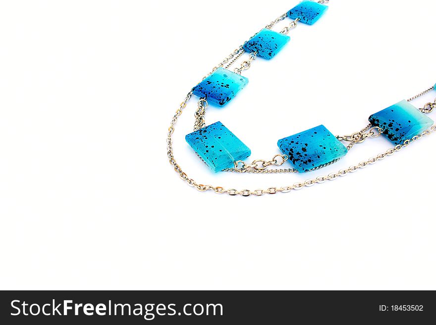 Blue necklace isolated on white background.