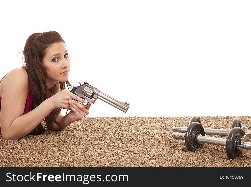 Woman Pointing Gun At Weights Serious