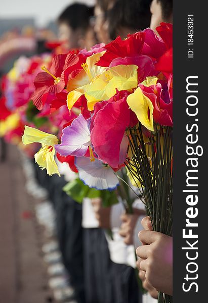 Games opening ceremony,Teenagers holding flowers