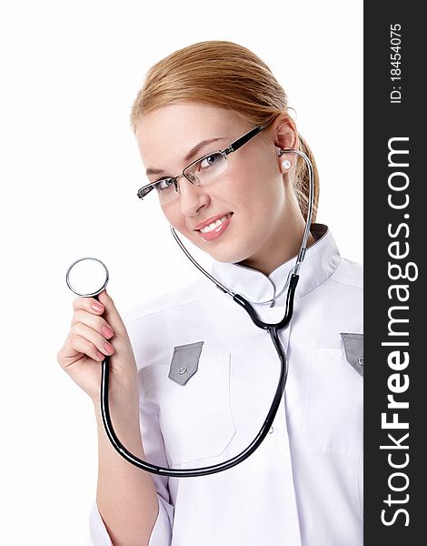 Attractive nurse with a stethoscope on a white background. Attractive nurse with a stethoscope on a white background