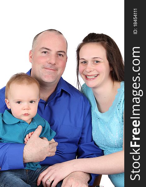 Family of three against a white background