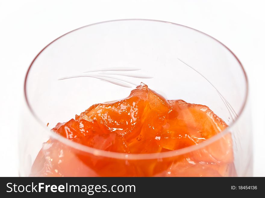 Jam from apples in glass, closeup, on white background. Jam from apples in glass, closeup, on white background