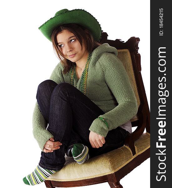 A pretty young teen with a silly expression dressed to celebrate St. Patricks Day. Isolated on white. A pretty young teen with a silly expression dressed to celebrate St. Patricks Day. Isolated on white.