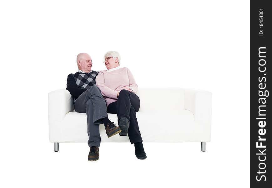 Older couple in a sofa