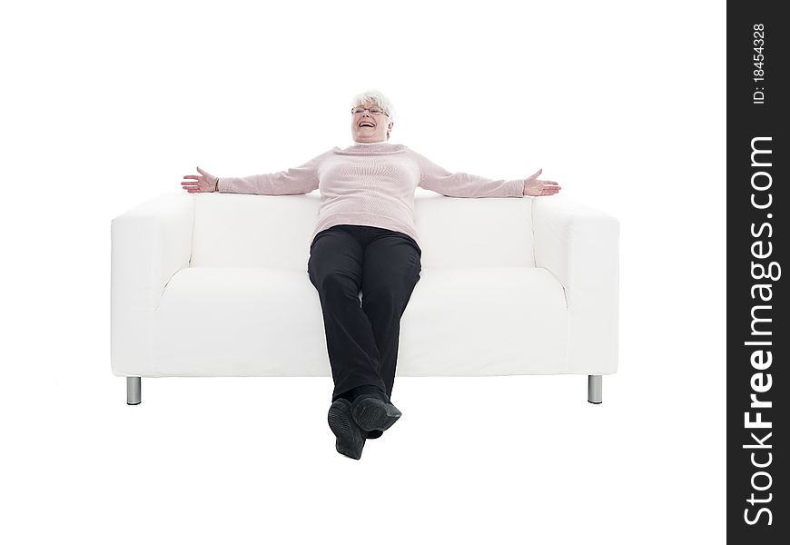 Older Woman In A Sofa