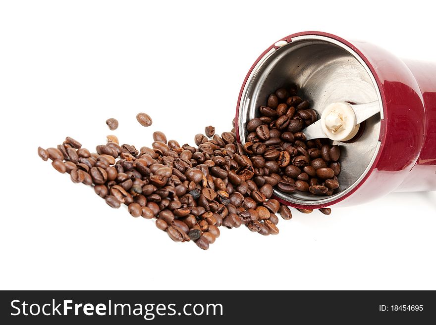 Electric coffee grinder and coffee isolated on white background