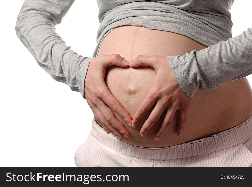 Pregnant young woman in studio. Pregnant young woman in studio