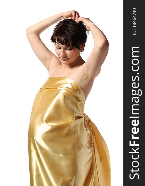 Pregnant young woman in golden in studio. Pregnant young woman in golden in studio