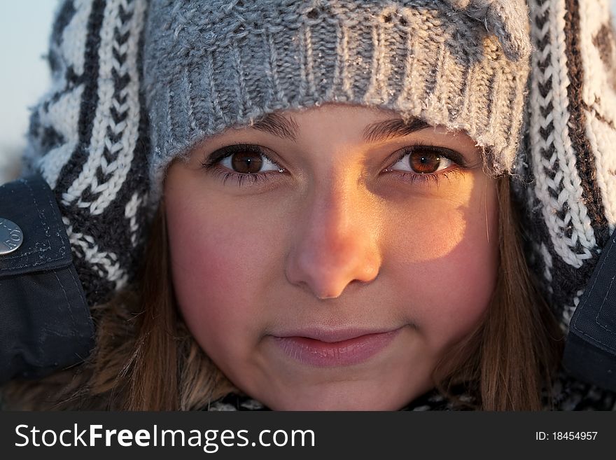 Portrait of a beautiful girl close up in winter. Portrait of a beautiful girl close up in winter
