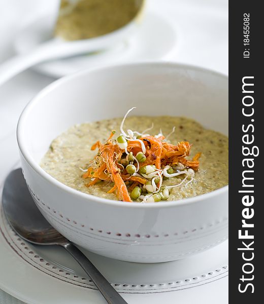 Vegetarian cream soup with vegetable, decorated with pies and carrot